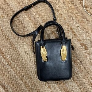 Black Leather Handbag with Gold Accents